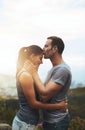 Forehead, love or happy couple kiss in nature outdoor date with loyalty for romance, care or respect. Mockup space