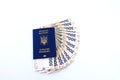 Foreign biometric passport with inscription in Ukrainian - Passport Ukraine, with new banknotes 500 hryvnia on a white background
