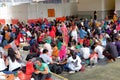 Foreign domestic workers gathering at a vacant plot of land underneath a train station in Singapore, on a Sunday afternoon