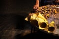 Foreign man is roasting some chestnuts in Navona Square, Christmas, Rome, Italy