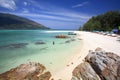 Foreign man on turquoise andaman sea and beach of Ko Lipe