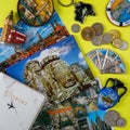 various passports and souvenir magnets from several world country