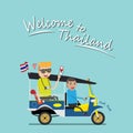 Foreign tourist take tuk tuk for sightseeing attraction around Bangkok, Thailand. tuk tuk is a local taxi vehicle with three wheel