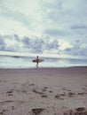 foreign tourist are walking on the shore of Canggu beach on a cloudy afternoon for surfing on the island of bali