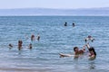 Foreign tourists float on the Dead Sea in Jordan.