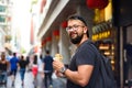Foreigner eating Chinese street food Royalty Free Stock Photo