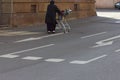 foreigner muslim turkish senior lady with shopping cart