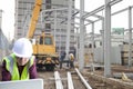Foreman construction site using laptop