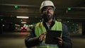 Foreman inspecting parking lot underground urban industrial heavy industry engineer Arabian man Indian builder in hard Royalty Free Stock Photo