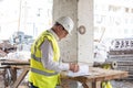 Foreman officer inspector, building Inspector, engineer or inspector at construction site checking and inspecting Royalty Free Stock Photo