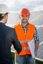 Foreman shaking hand to a business client.