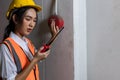 Foreman or worker pushing fire alarm on the wall. A fire! or Emergency case at the factory building. Emergency of Fire alarm or al Royalty Free Stock Photo