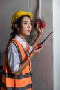 Foreman or worker pushing fire alarm on the wall. A fire! or Emergency case at the factory building. Emergency of Fire alarm or al Royalty Free Stock Photo