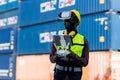 Foreman or worker use remote controller piloting drone at containers port for checking container. Foreman use remote control Drone Royalty Free Stock Photo