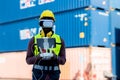 Foreman or worker use remote controller piloting drone at containers port for checking container. Foreman use remote control Drone Royalty Free Stock Photo