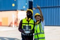 Foreman or worker use remote controller piloting drone at containers port for checking container. Foreman use remote control Drone Royalty Free Stock Photo