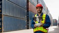 Foreman or worker use remote controller piloting drone at containers port for checking container. Foreman use remote control Drone Royalty Free Stock Photo