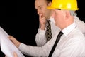Foremen looking at plans Royalty Free Stock Photo