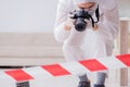 The forensic expert at crime scene doing investigation Royalty Free Stock Photo