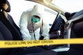 Forensic Science. Criminologist investigates a crime scene. Royalty Free Stock Photo