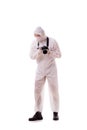 The forensic specialist in protective suit taking photos on white