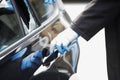 forensics in case of car burglary Royalty Free Stock Photo