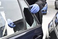 Forensics in case of car burglary Royalty Free Stock Photo