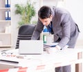 Forensics investigator at the scene of office crime Royalty Free Stock Photo