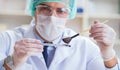 Forensics investigator working in lab on crime evidence Royalty Free Stock Photo