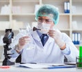 Forensics investigator working in lab on crime evidence Royalty Free Stock Photo