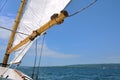 Foresail and Wooden Mast of Schooner Sailboat Royalty Free Stock Photo