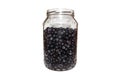 Forest berry blueberries in a glass jar.