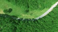 The forest in Da Lat, Lam Dong in top view by drone | 4K aerial of flying over a beautiful green forest in a rural landscape