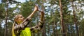 forest development and management. valuation and appraisal of forest. appraiser taking pictures of trees, biomass estimation