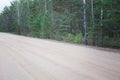 Forest dirt muddy road. Sandy country road in wood