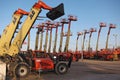 A forest of erected forklifts