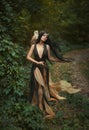 Mysterious sorceress with a bird Royalty Free Stock Photo