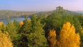 Forest in the fall lake in autumn view from the sky. Lake reflections of fall foliage. Aerial Colorful autumn foliage Royalty Free Stock Photo