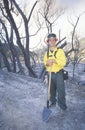 Forest fire fighter holding shovel, Los Angeles Padres National Forest, California