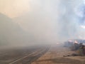 Forest Fire With Smoke Blocking The Road Royalty Free Stock Photo