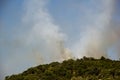 Forest Fire Smoke On The Slopes Hills. Fire In Mountain Forest. Wild Fire In Forests Royalty Free Stock Photo