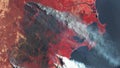 Forest fires in Australia, a view from space. Environmental problems, a large fire in the forest,
