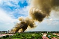 Forest fires in the city on a hot oversupply. Firefighter helped hasten to prevent fire spread to the village.