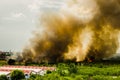 Forest fires in the city on a hot oversupply. Firefighter helped hasten to prevent fire spread to the village.