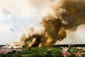 Forest fires in the city on a hot oversupply. Firefighter helped hasten to prevent fire spread to the village.