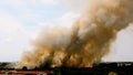 Forest fires in the city on a hot oversupply. Firefighter helped hasten to prevent fire spread to the village.