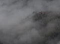 The forest guard house in a low cloudy morning, Geres National Park, Terras de Bouro. Royalty Free Stock Photo