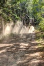 Forest harvester in the dust