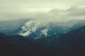 Forest on hills and mountains in clouds and fog Royalty Free Stock Photo