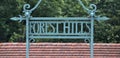 forest hills sign on the train platform (railway station in queens, long island) rail, railroad commute, travel Royalty Free Stock Photo